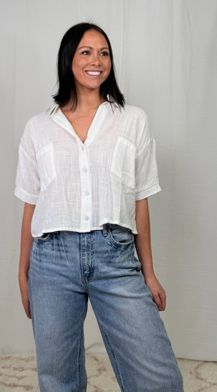 lightweight white cotton short sleeve blouse styled with denim
