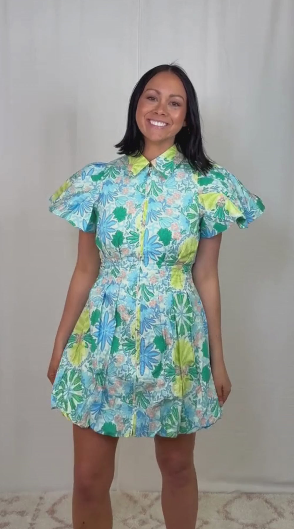 Women’s cotton floral mini dress with short flutter sleeves