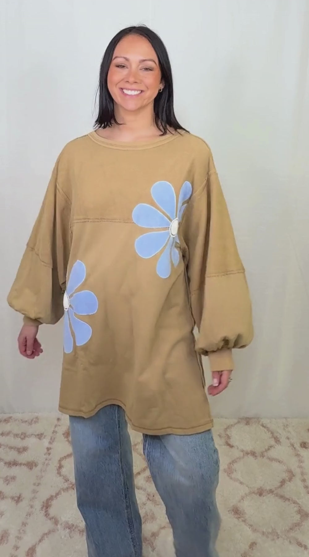 video Brown oversized sweatshirt dress with floral appliqué worn as a casual outfit