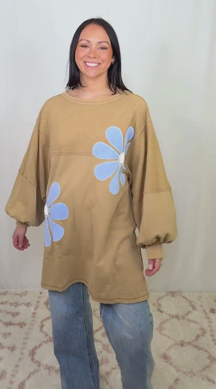 video Brown oversized sweatshirt dress with floral appliqué worn as a casual outfit