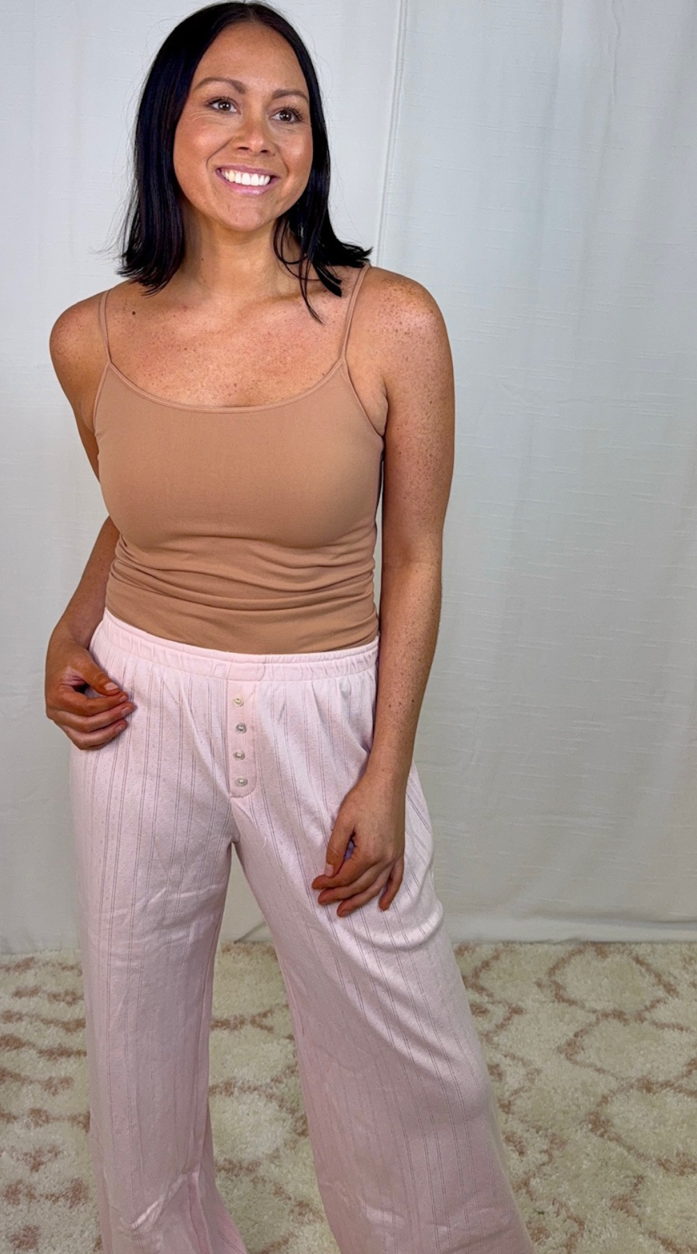 Pink cotton lounge pants with subtle ribbed texture